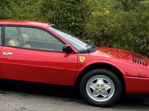 Police are calling on the public to help find a stolen red Ferrari.