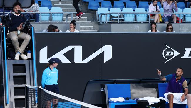 Nick Kyrgios argues with the match referee in his singles match against Harry Bourchier. Picture: Getty Images.