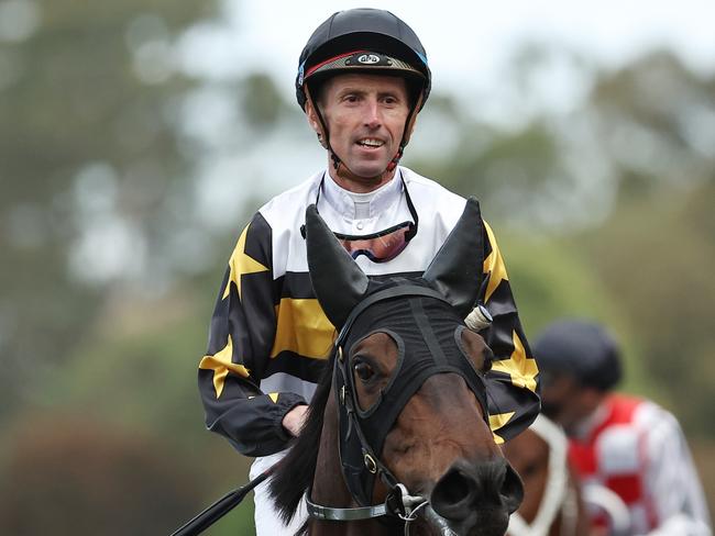 SYDNEY, AUSTRALIA - OCTOBER 12: Nash Rawiller riding Here To Shock wins Race 8 Alan Brown Stakes during Sydney Racing at Rosehill Gardens on October 12, 2024 in Sydney, Australia. (Photo by Jeremy Ng/Getty Images)