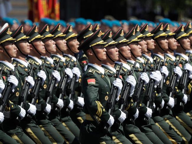 Soldiers from China's People's Liberation Army march on Red Square. Picture: Pavel Golovkin