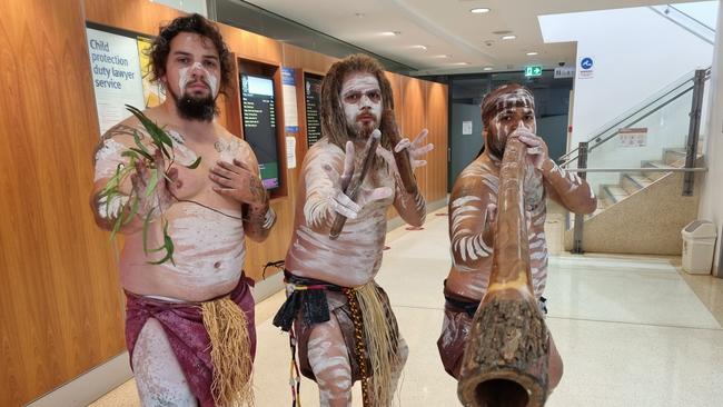 Performing at the courthouse are (from left) Damon Miri Anderson, songman Thiramayinj and Karntu Marlinj of Mura Biri Gururu dance group. Picture: Peter Hardwick