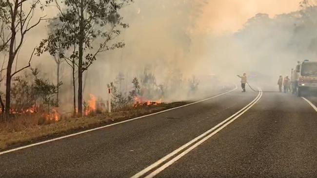 Fire crews at the Long Gully Rd bushfire near Drake in 2019.