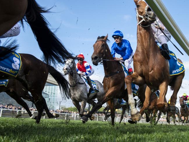 MELBOURNE, AUSTRALIA - OCTOBER 19: Andrea Atzeni riding Zardozi in first lap in Race 9, the Sportsbet Caulfield Cup - Betting Odds during Melbourne Racing at Caulfield Racecourse on October 19, 2024 in Melbourne, Australia. (Photo by Vince Caligiuri/Getty Images)