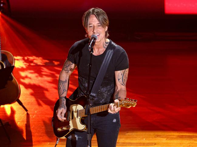 NASHVILLE, TENNESSEE - AUGUST 21: In this image released on September 18, 2024, Keith Urban performs onstage during the 17th Academy Of Country Music Honors at Ryman Auditorium on August 21, 2024 in Nashville, Tennessee. (Photo by Brett Carlsen/Getty Images for ACM)