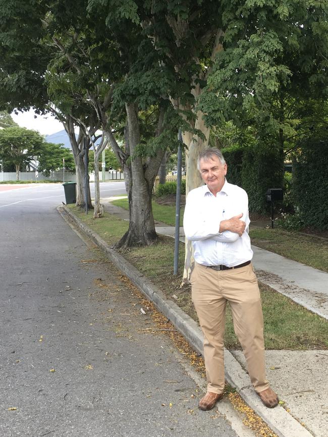 Local resident Eugene O'Sullivan with the trees outside his property that will be removed. Picture: Darren Cartwright