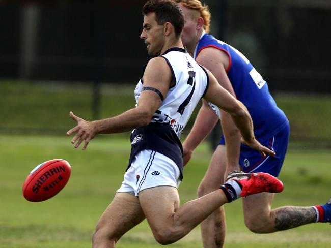 NFL footy: North Heidelberg v BundooraSam Lloyd (number 2) in action for  Bundoora.Picture: Stuart Milligan