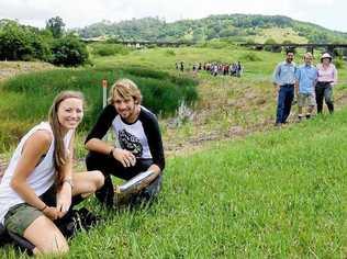 FIELD TRIP: Touring Lismore City Council’s constructed wetland at Slaters Creek are Southern Cross University natural resource management students Sam Walker and Trent McIntyre, with (back from left) council environmental strategies officer Anton Nguyen, SCU lecturer Dr Antony McCardell and the Water and Carbon Group’s Katrina Curran. Picture: Contributed