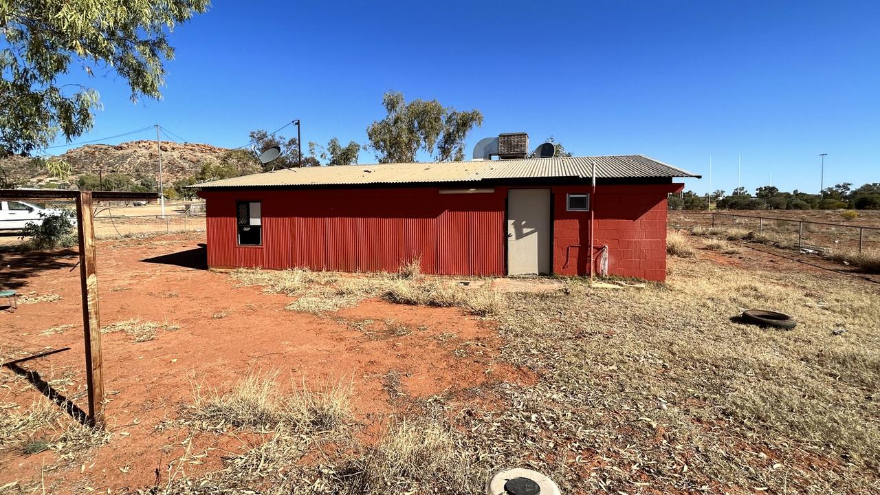 More than 70 households in Santa Teresa (Ltyentye Apurte) sued the NT Housing chief executive over a failure to provide urgent repairs to a list of 600 issues in their homes, including Kwementyaye Young's six year wait to replace her missing door.