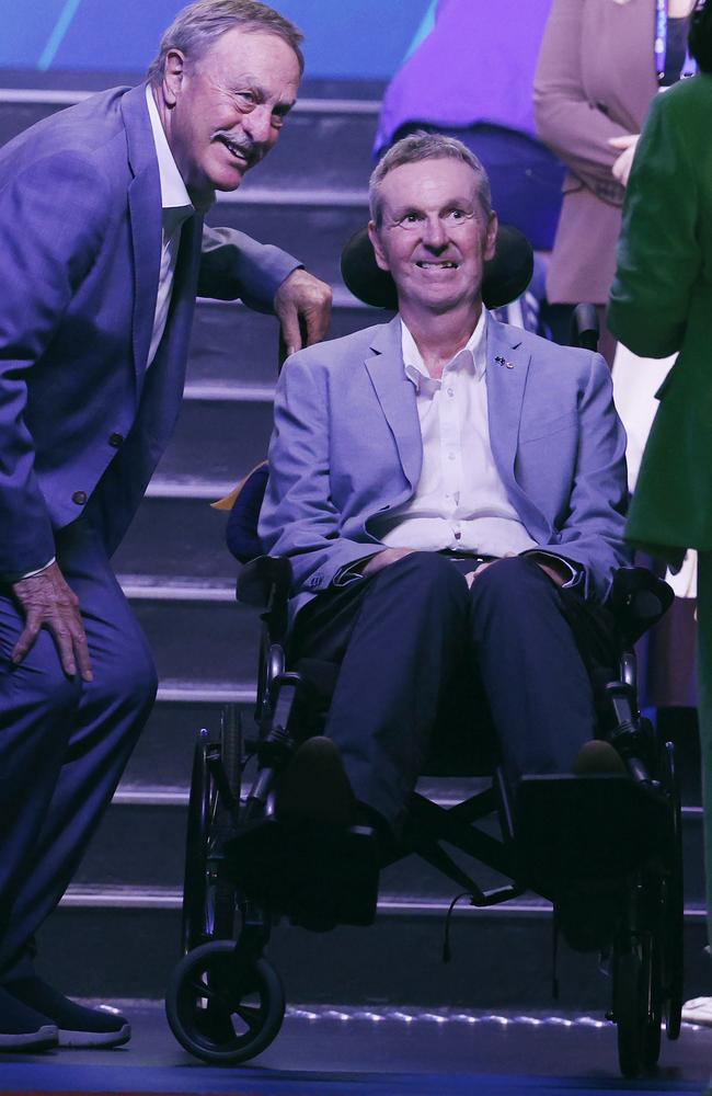 Daniher with tennis legend John Newcombe. Picture: Michael Klein