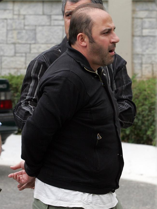 Tony Mokbel is taken to an Athens jail in preparation for his extradition to Australia in 2008. Picture: Tim Anderson