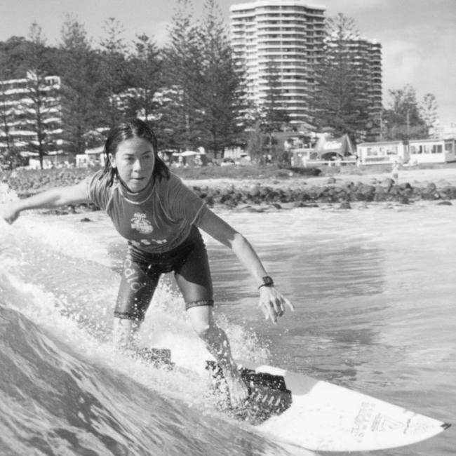 Pauline Menczer surfing at Burleigh Heads on the Gold Coast. sport action scenic qld may 1996