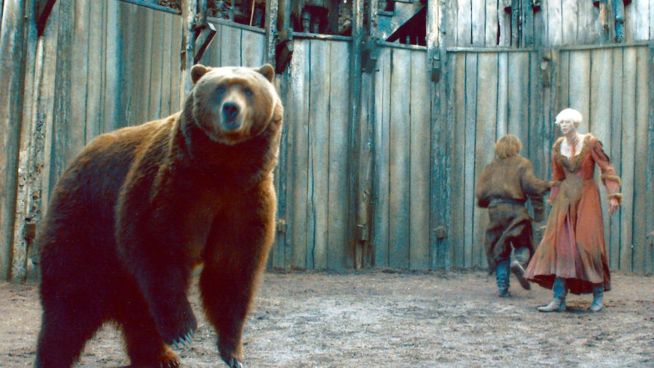 Bart the Bear II in a bear pit alongside Brienne of Tarth, played by actor Gwendoline Christie, in the hit HBO series <i>Game of Thrones</i>.