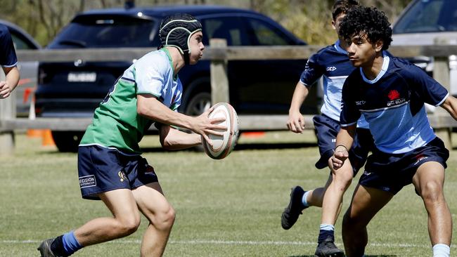 Max Prykiel from Team Ella with the ball.