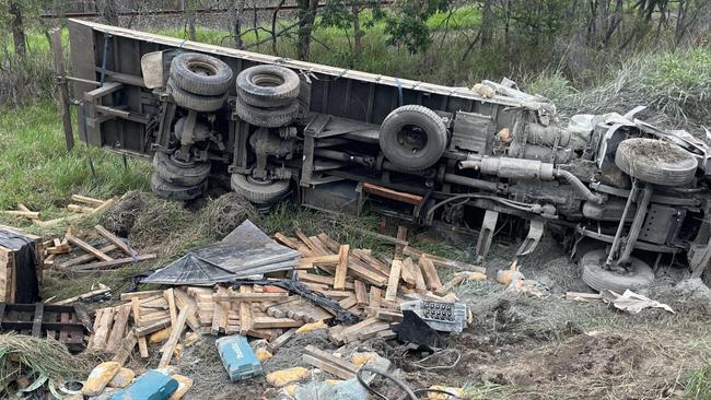 A truck driver has died following a horror rollover on the Bruce Highway at Clairview on Monday, November 27, 2023. Picture: Zoe Devenport