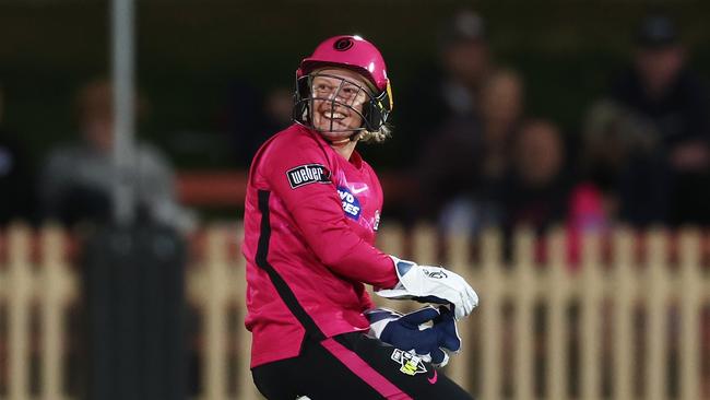 SYDNEY, AUSTRALIA - NOVEMBER 18: Alyssa Healy of the Sixers reacts during the Women's Big Bash League match between the Sydney Sixers and the Sydney Thunder at North Sydney Oval, on November 18, 2022, in Sydney, Australia. (Photo by Matt King/Getty Images)