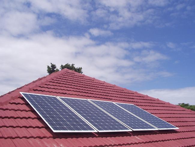 HOMES A generic photo of house with solar panels on roof.