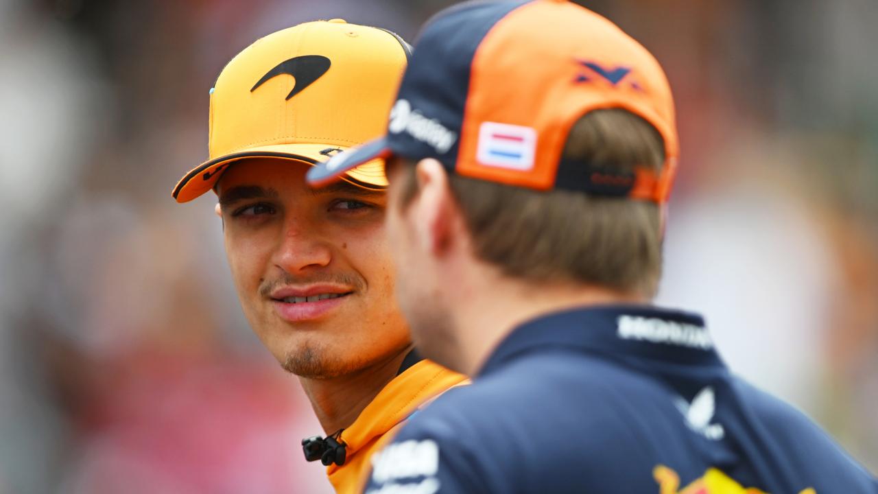 BARCELONA, SPAIN - JUNE 23: Lando Norris of Great Britain and McLaren talks with Max Verstappen of the Netherlands and Oracle Red Bull Racing on the drivers parade prior to the F1 Grand Prix of Spain at Circuit de Barcelona-Catalunya on June 23, 2024 in Barcelona, Spain. (Photo by Rudy Carezzevoli/Getty Images)