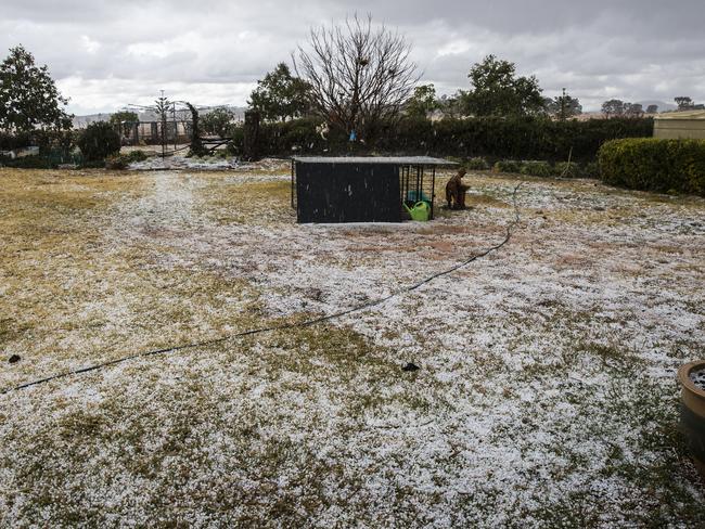 Heavy rain and hail blankets a property southwest of Gunnedah, which is currently in the worst drought on record. Picture: Dylan Robinson