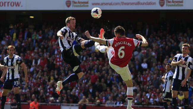 Laurent Koscielny (R) managed to hold West Brom’s attackers at bay.