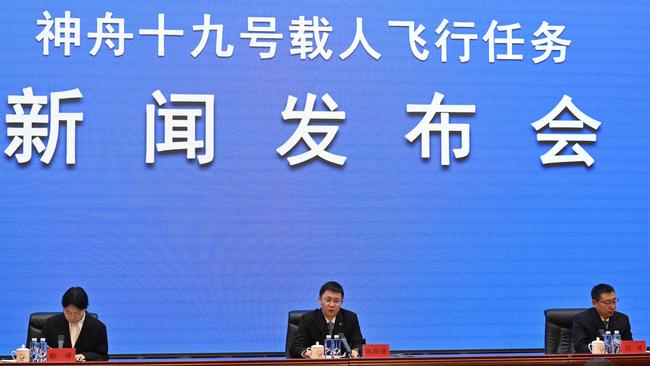 China Manned Space Agency (CMSA) Deputy Director Lin Xiqiang (C) speaks during a press conference at the Jiuquan Satellite Launch Center. (Photo: Adek Berry/ AFP)