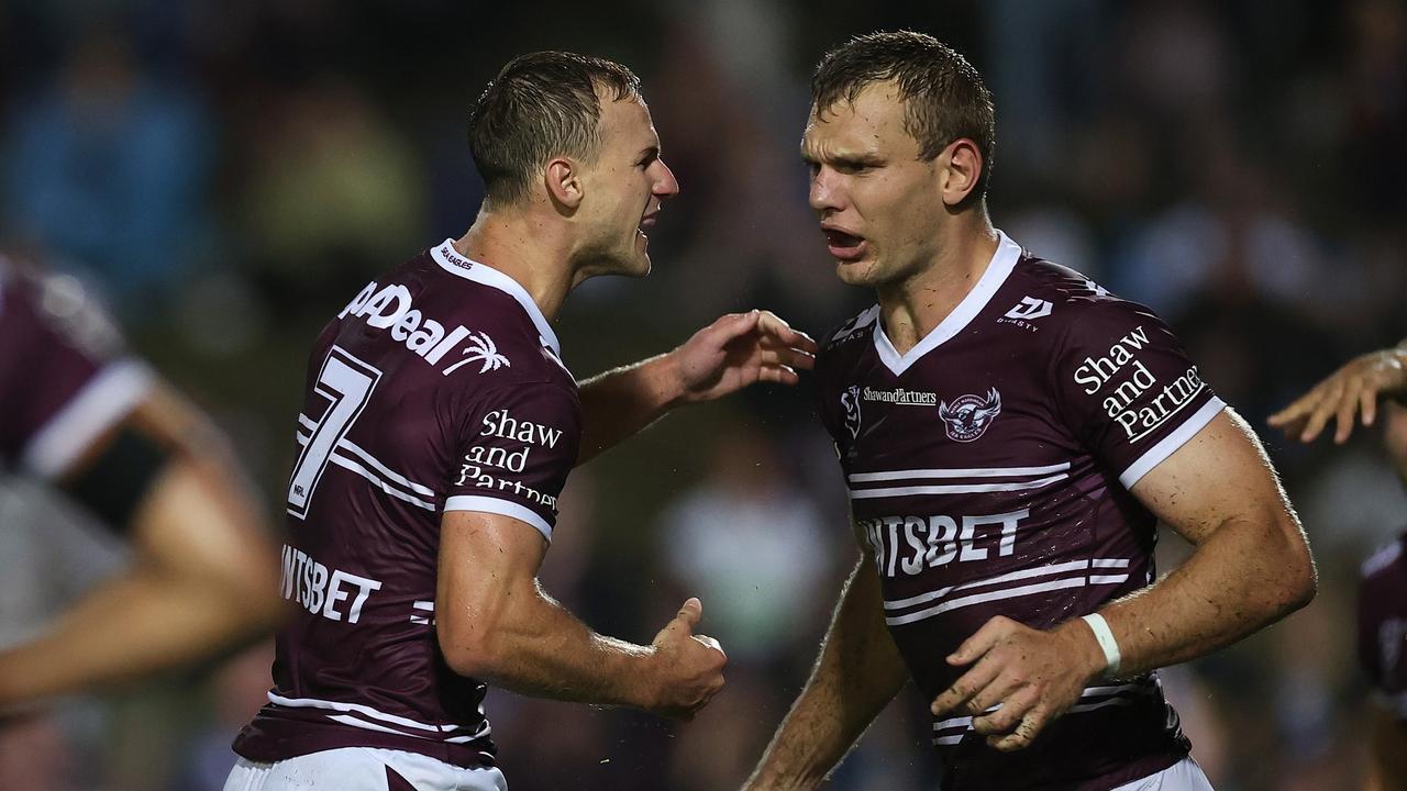 Daly Cherry-Evans celebrates his field with Tom Trbojevic (Photo by Cameron Spencer/Getty Images)