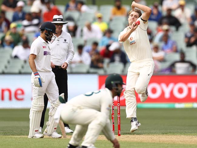 Cameron Green bowls his first ball in Test cricket at Adelaide Oval.