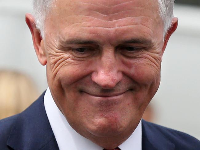 PM Malcolm Turnbull leaves after officiating at a citizenship ceremony by the shores of Lake Burley Griffin in Canberra. Picture: Ray Strange