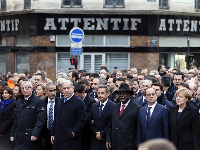 All together ... World leaders join the crowds in Paris. Picture: AFP