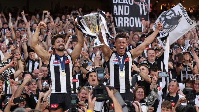 Josh and Nick Daicos enjoy the win. Picture: Robert Cianflone/AFL Photos/via Getty Images