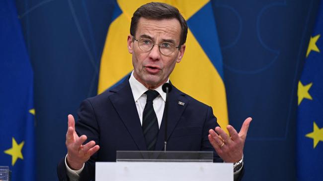 Sweden's Prime Minister Ulf Kristersson speaks to reporters. Picture: AFP.