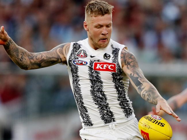 MELBOURNE, AUSTRALIA - APRIL 25: Jordan De Goey of the Magpies kicks the ball during the 2022 AFL Round 06 match between the Essendon Bombers and the Collingwood Magpies at the Melbourne Cricket Ground on April 25, 2022 in Melbourne, Australia. (Photo by Dylan Burns/AFL Photos via Getty Images)