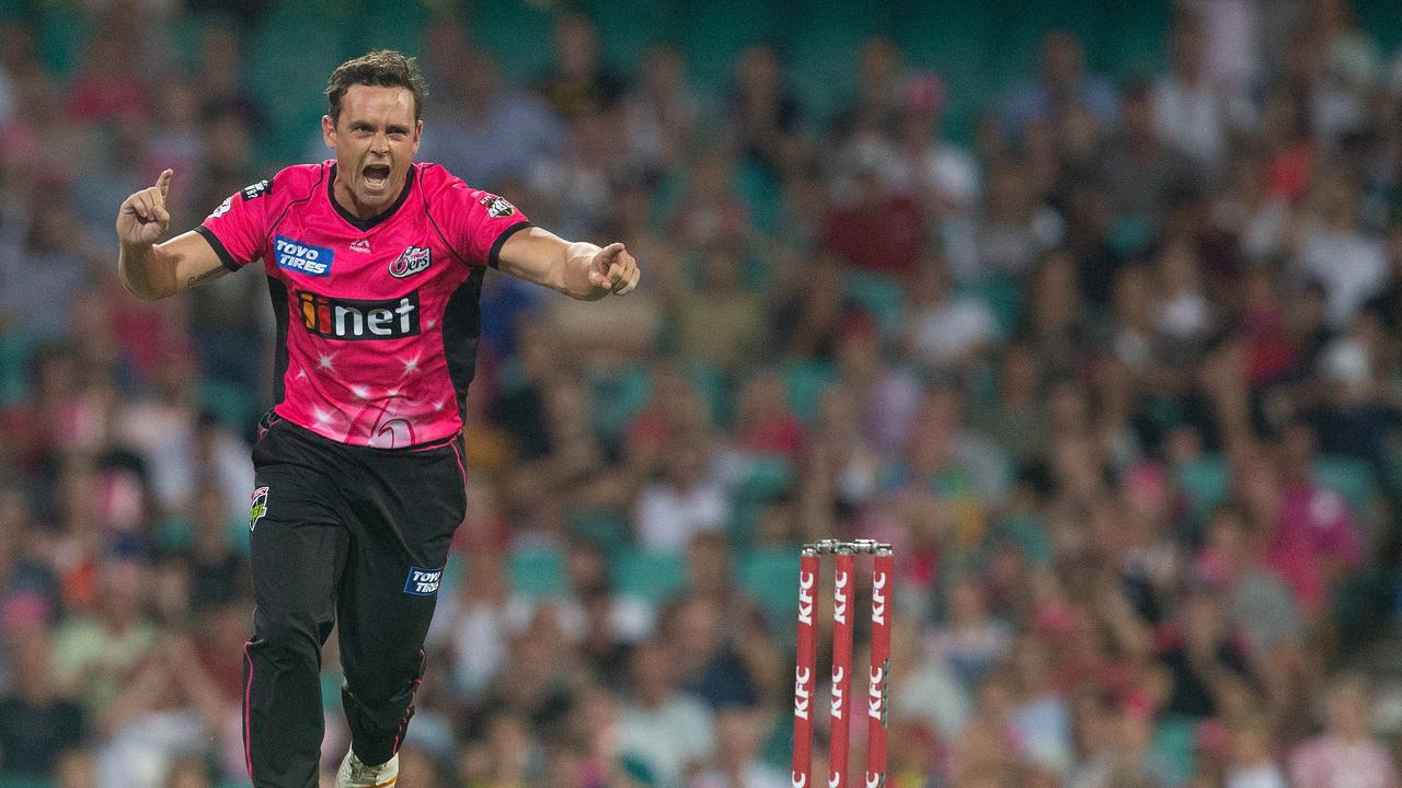 Steve O'Keefe of the Sixers celebrates taking another the wicket