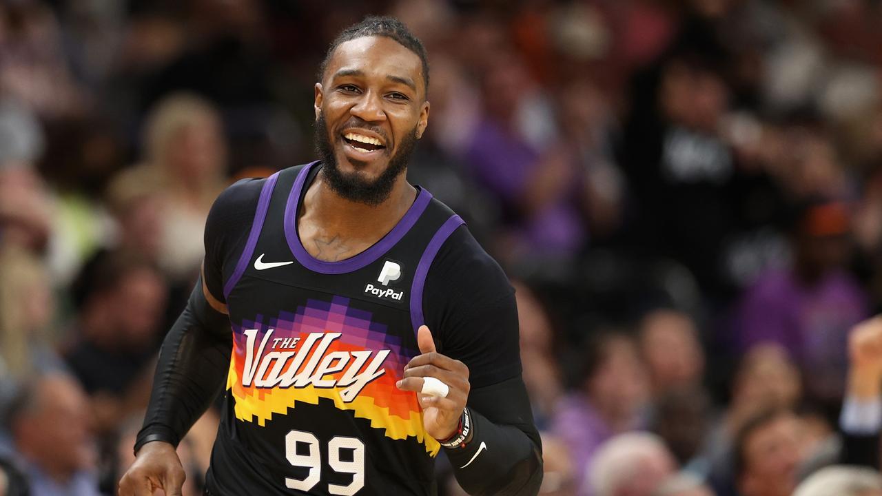 PHOENIX, ARIZONA - NOVEMBER 30: Jae Crowder #99 of the Phoenix Suns reacts after a three-point shot against the Golden State Warriors during the first half of the NBA game at Footprint Center on November 30, 2021 in Phoenix, Arizona. NOTE TO USER: User expressly acknowledges and agrees that, by downloading and or using this photograph, User is consenting to the terms and conditions of the Getty Images License Agreement. (Photo by Christian Petersen/Getty Images)