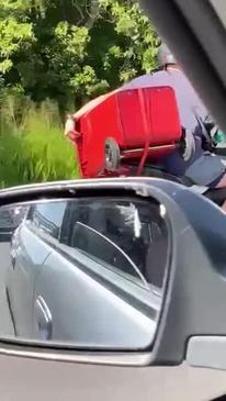 Wheelie bin biker spotted on Bruce Highway