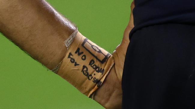 No Room For Racism written on the wrist tape of Eddie Betts in 2021. Picture: Michael Klein