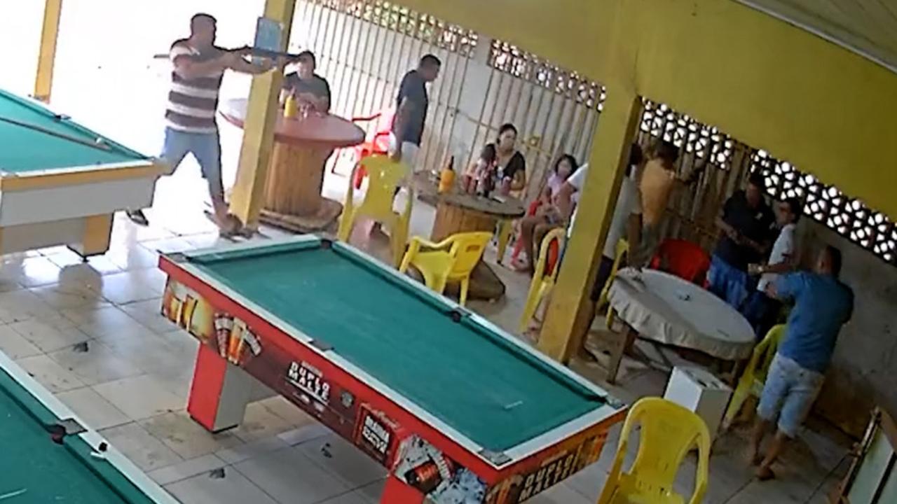 Horrific video captured the moment two gunmen opened fire inside a pool hall in Brazil. Picture: Newsflash/Australscope