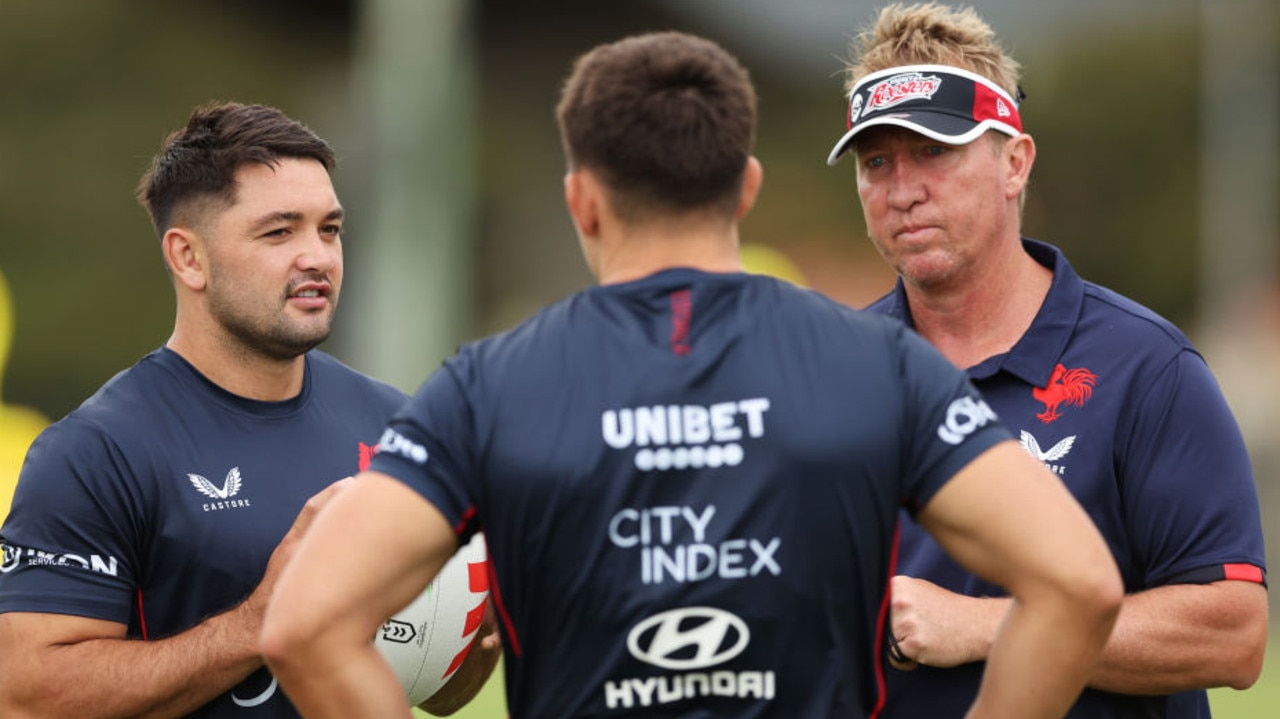 SYDNEY, AUSTRALIA - FEBRUARY 28: Brandon Smith talks to Roosters head coach Trent Robinson during a Sydney Roosters NRL training session at Kippax Lake on February 28, 2023 in Sydney, Australia. (Photo by Matt King/Getty Images)