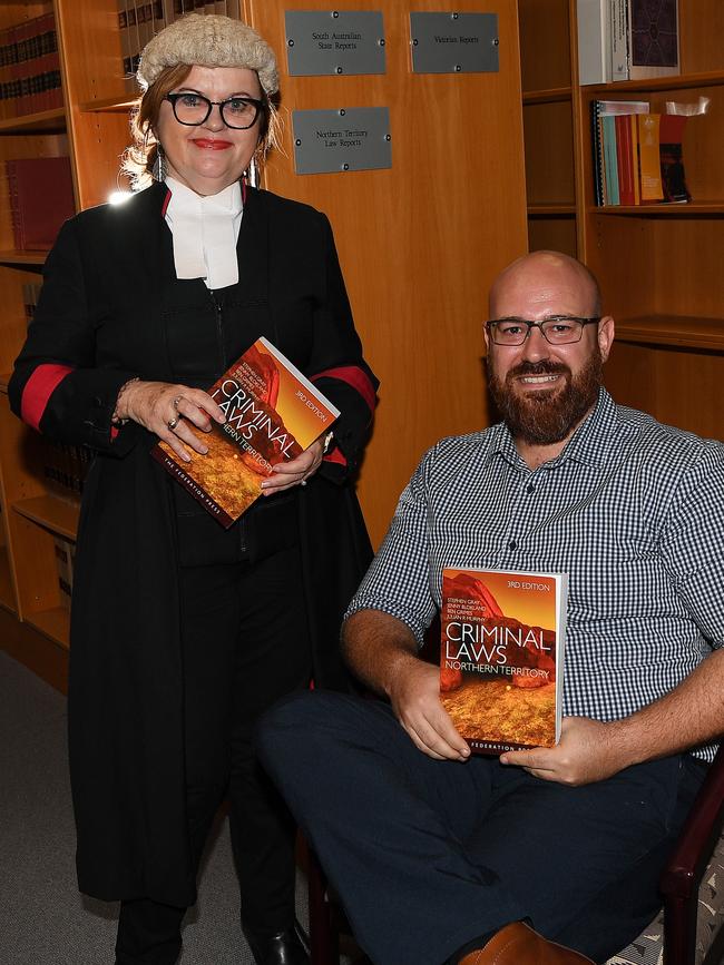 Co-authors Justice Jenny Blokland and CDU lecturer Ben Grimes. Picture: Katrina Bridgeford