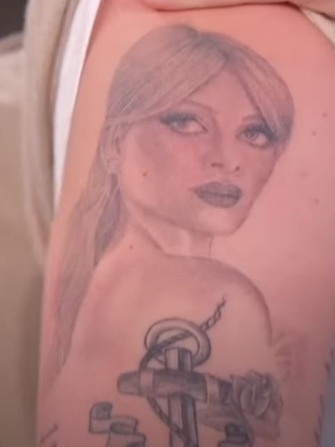 This tattoo is meant to be of Nicola.