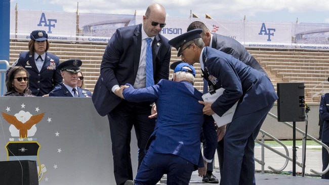 Biden loses his footing during a United States Air Force Academy graduation ceremony at Falcon Stadium in Colorado in June. Picture: AP