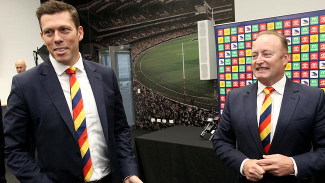 Andrew Fagan, with Adelaide chairman Rob Chapman, has resigned as Crows chief executive. Picture: AAP