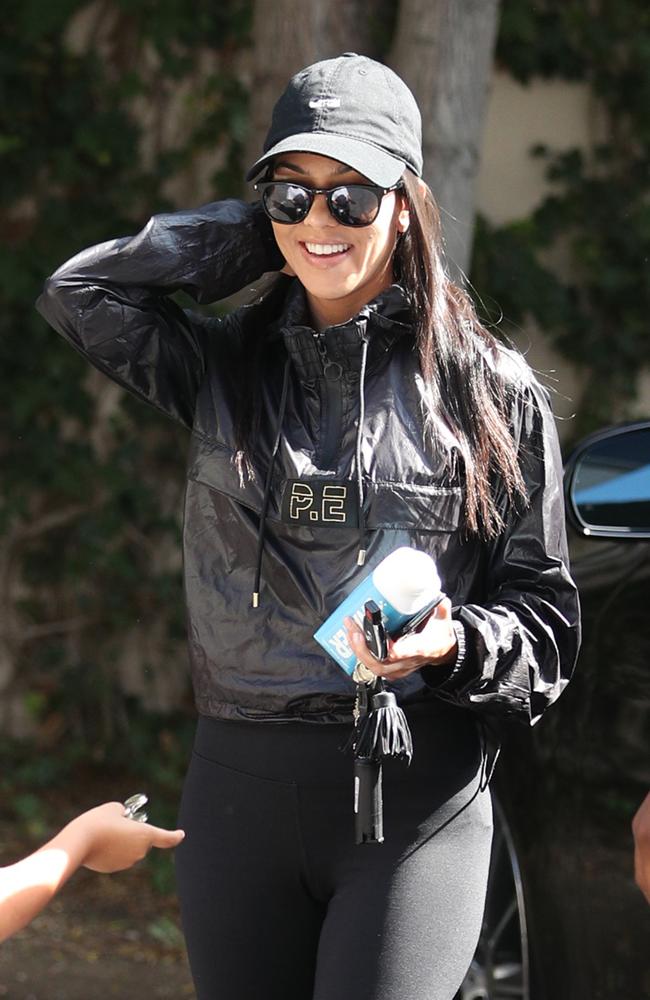 Back to black Kourtney Kardashian, wearing P.E Nation. Picture: Splash