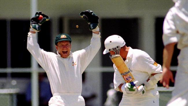 First Test, Australia v England at the Gabba, Brisbane, Day 4. Wicket keeper Ian Healy catches ball after Alec Stewart is bowled out by Warne. 28 November 1994. Sport / Cricket / Action