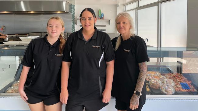 Jacoba Murray with manager Ashlee Dockery and Kerri Connors from Seaside Takeaway Hervey Bay.