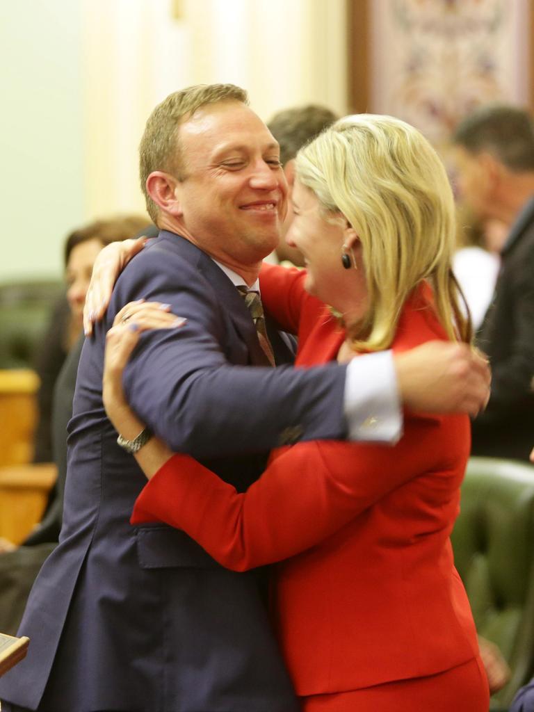 Steven Miles embraces Shannon Fentiman. Picture: AAP Image/Steve Pohlner