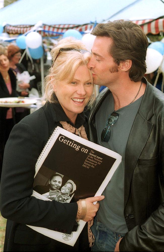 Deborra-lee Furness with husband Hugh Jackman at the launch of a refugee calendar in 2002.