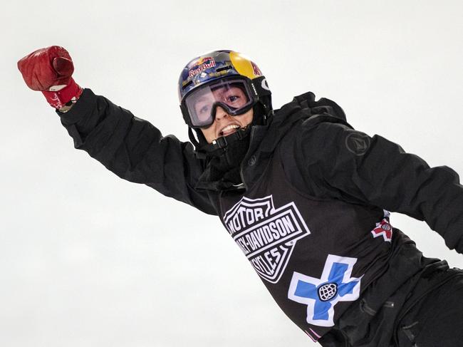 Scotty James pumps his fist in the air after his run in the men's SuperPipe finals during the Aspen Winter X Games at Buttermilk Mountain in Aspen, Colo., Sunday, Jan. 27, 2019. James took home the gold medal in the event with a score of 94.00. (Liz Copan/The Gazette via AP)