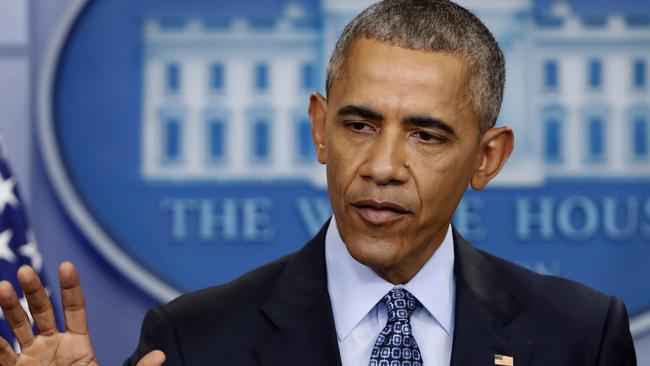 Barack Obama speaks during his final presidential news conference. AP.