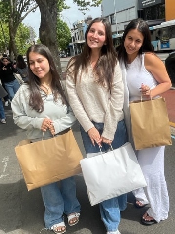 Girls leaving with bags of bargains. Picture: News.com.au