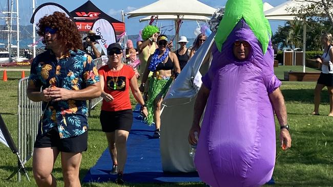 Competitors head off on the inaugural walkathon in Airlie Beach, organised by Whitsunday Triathlon Club to raise funds for Whitsunday Suicide Prevention Network.